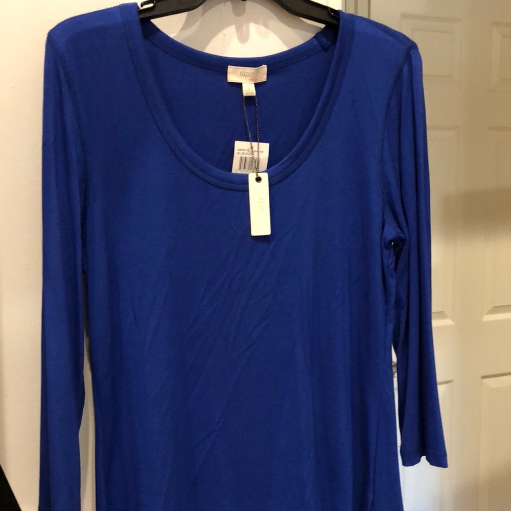 Electric Blue long Sleeve Top. Brand new. Super light weight. Stunning color